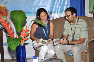 An exhibitor with a hosted buyer during MKTE event in Diani. About 35 countries were represented in the exposition to showcase Kenya’s tourism products.